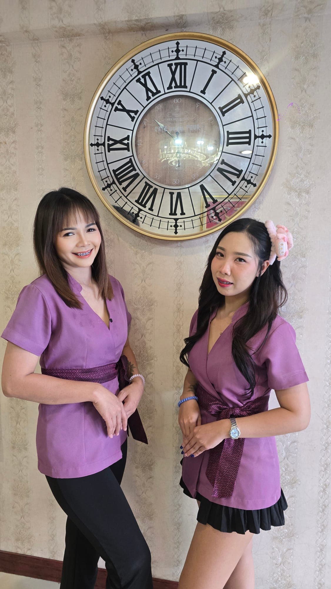 Two Cher Ploy therapists in spa uniform